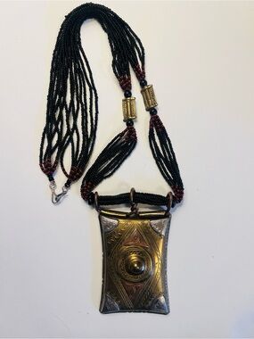 Vintage Ethnic Statement Necklace with Brass Pendant and Black Beaded Strands